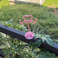 early 00s pink jewelry stand